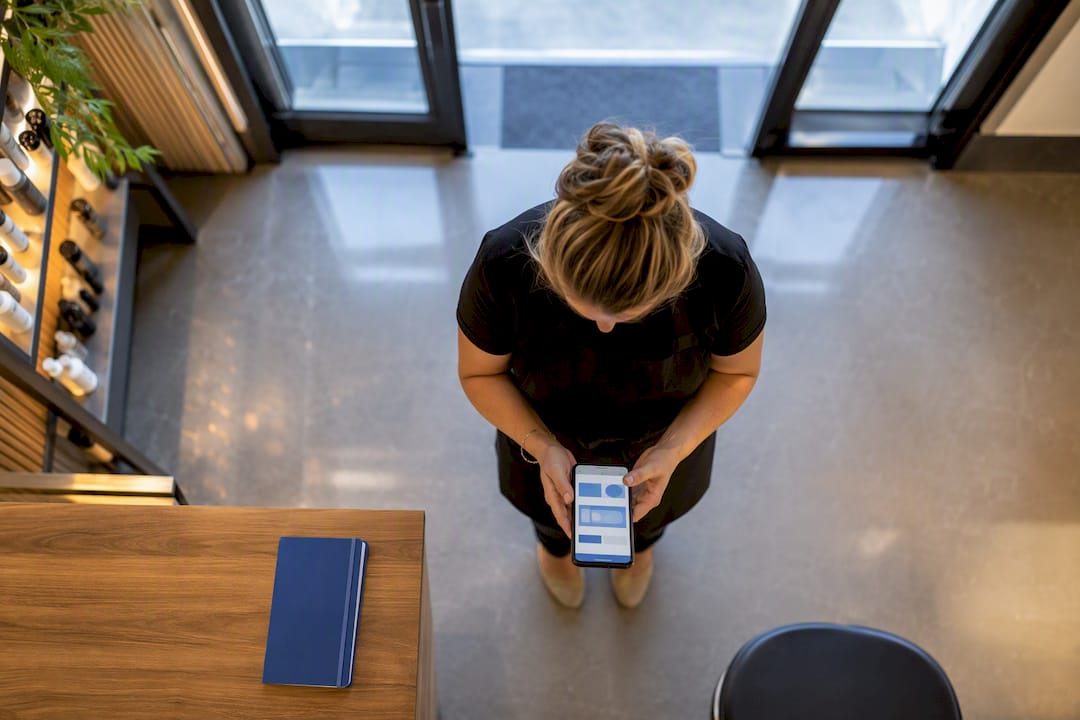 Salon owner checking Google Maps listing