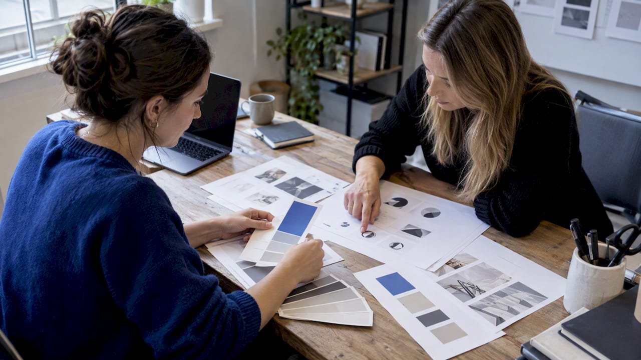 Clinic team reviewing accessible brand materials