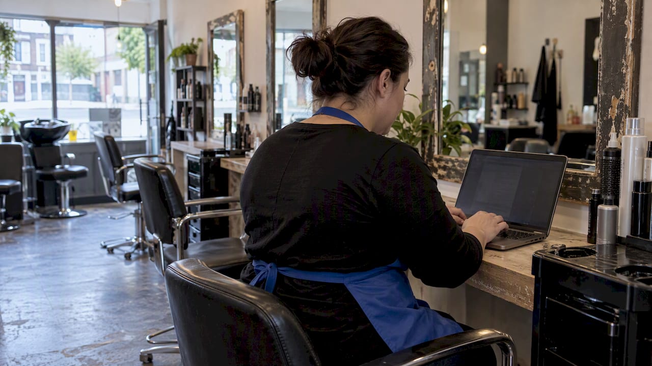 Salon owner drafting a local press pitch