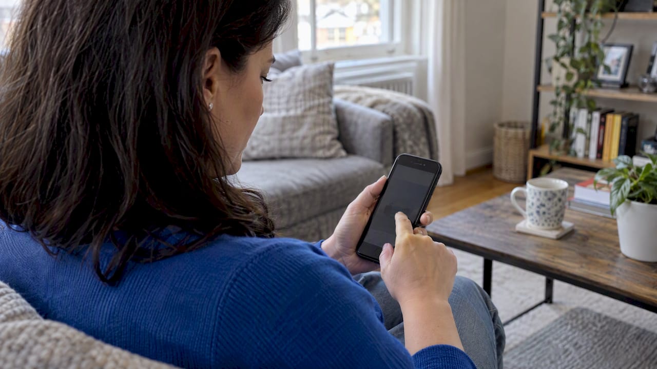 Client answering a med spa quiz on her phone
