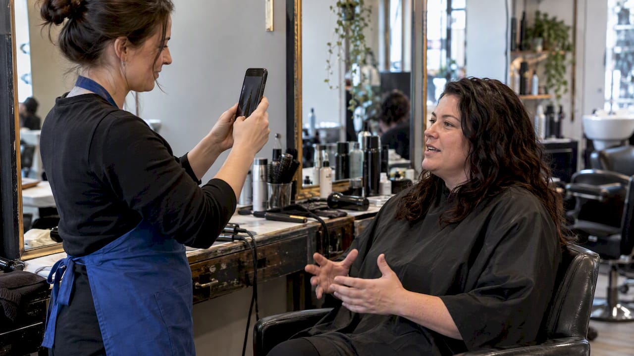 Salon client sharing her experience on camera